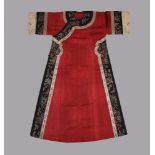 An attractive Chinese Manchu red celebration robe