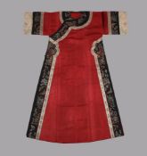 An attractive Chinese Manchu red celebration robe