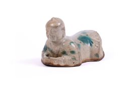A Chinese stoneware 'Boy' pillow