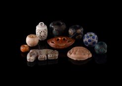 An interesting group of four inlaid glass 'eye' beads