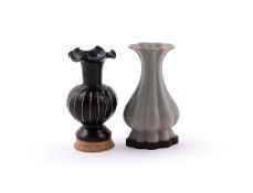 A Chinese black glazed cizhou ribbed vase