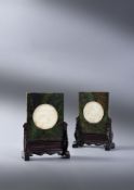 A pair of Chinese white and spinach jade table screens