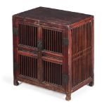 A small Chinese wood openwork cabinet
