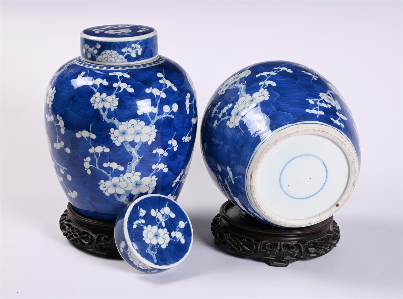 A pair of Chinese blue and white 'prunus' ginger jars and covers - Image 2 of 2