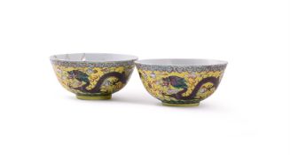 A pair of Chinese yellow-ground Famille Rose 'Dragon' bowls