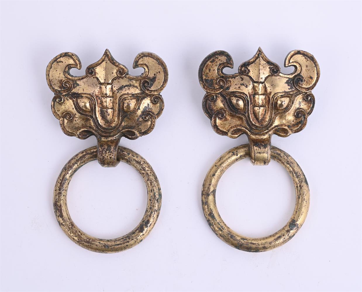 A pair of Chinese gilt bronze taotie handles with suspending rings - Image 2 of 3