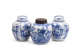 A pair of Chinese blue and white ginger jars and covers