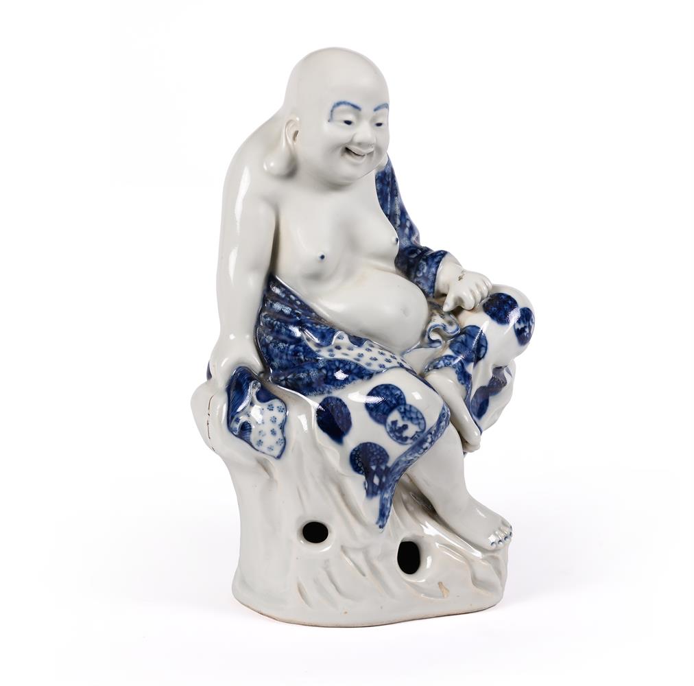 A Chinese blue and white figure of a seated Luohan - Image 2 of 4