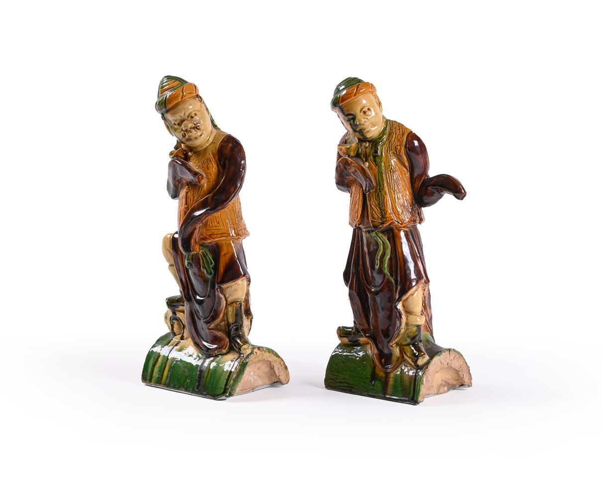 An unusual pair of Sancai-glazed ridge-tile figures of 'dancers'