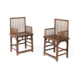 A pair of Chinese hardwood armchairs