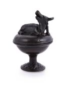 A Chinese bronze 'Buffalo' footed censer and cover