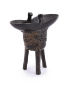 A Chinese bronze jue vessel