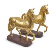 AFTER GIAMBOLOGNA, A PAIR OF ITALIAN GILDED PLASTER HORSES, LATE 19TH/EARLY 20TH CENTURY