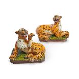 A PAIR OF ITALIAN GLAZED POTTERY MODELS OF LEOPARDS, 20TH CENTURY