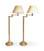 A PAIR OF ADJUSTABLE BRASS READING LAMPS, MODERN