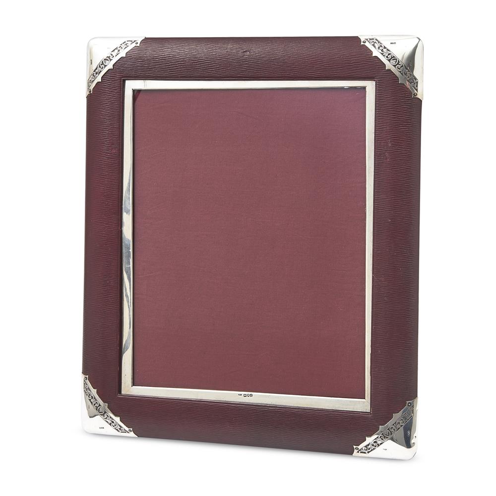 A LATE VICTORIAN LARGE RED LEATHER AND SILVER MOUNTED PHOTOGRAPH FRAME