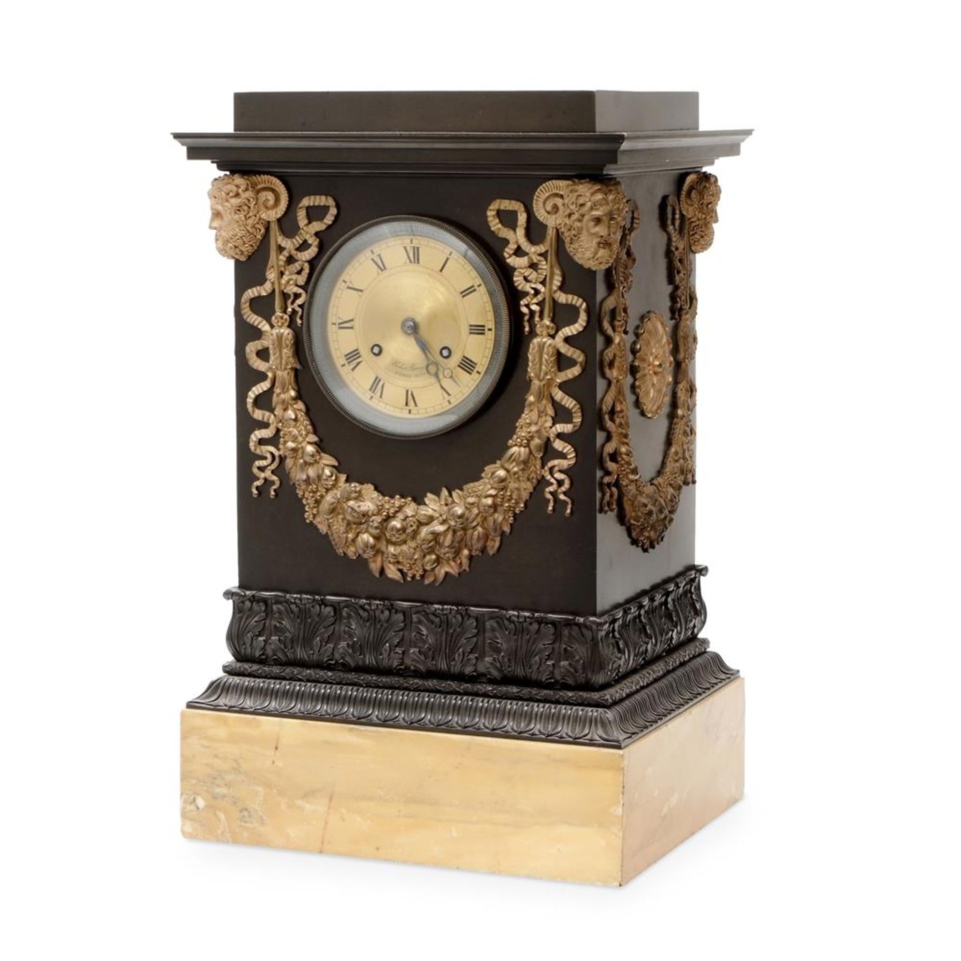 A FRENCH EMPIRE BRONZE MANTLE CLOCK ON SIENA BASE, CIRCA 1820