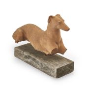 A TERRACOTTA FIGURE OF A WHIPPET, 19TH CENTURY