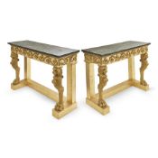 A PAIR OF GILTWOOD AND GILT BRONZE CONSOLE TABLES IN THE EMPIRE TASTE