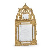 A FRENCH OR LOW COUNTRIES CARVED GILTWOOD MIRROR, 18TH CENTURY