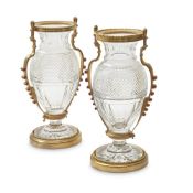 A PAIR OF BACCARAT CUT AND MOULDED GLASS AND GILT METAL MOUNTED VASES, 20TH CENTURY