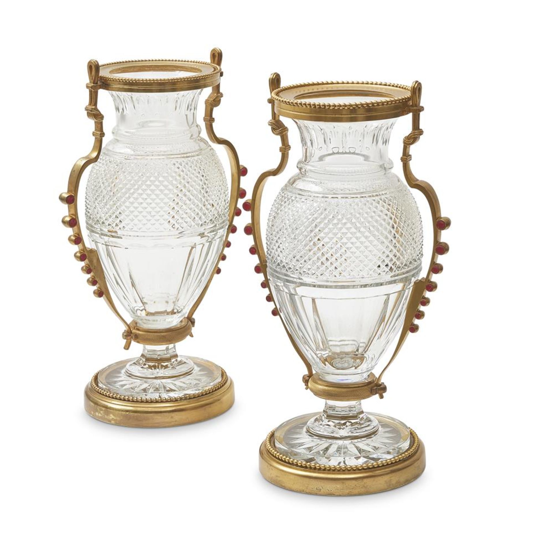 A PAIR OF BACCARAT CUT AND MOULDED GLASS AND GILT METAL MOUNTED VASES, 20TH CENTURY