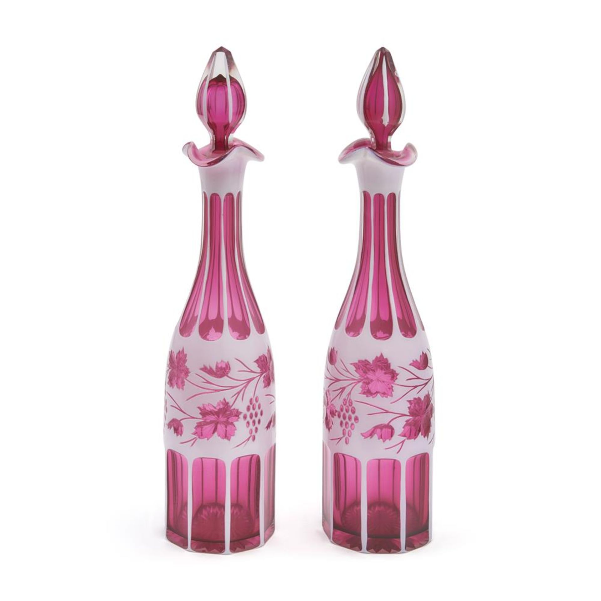 A PAIR OF RUBY AND OPAQUE-WHITE OVERLAY GLASS DECANTERS AND STOPPERS, THIRD QUARTER 19TH CENTURY