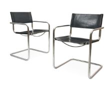 A PAIR OF CHROMED STEEL AND LEATHER CANTILEVERED ARMCHAIRS AFTER DESIGNS BY MART STAM