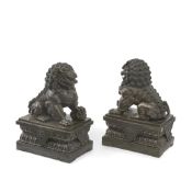 A PAIR OF CHINESE BRONZE LION TEMPLE GUARDIANS, CIRCA 1920