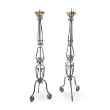 A PAIR OF ITALIAN WROUGHT IRON AND PARCEL GILT PRICKET TORCHERES, EARLY 20TH CENTURY