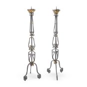 A PAIR OF ITALIAN WROUGHT IRON AND PARCEL GILT PRICKET TORCHERES, EARLY 20TH CENTURY