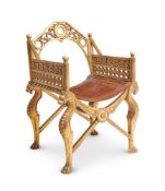 A CARVED GILTWOOD GOTHIC GROTTO ARMCHAIR ITALIAN, EARLY 20TH CENTURY