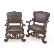 A PAIR OF ITALIAN, PROBABLY VENETIAN, CARVED WALNUT ARMCHAIRS, MID 19TH CENTURY