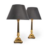 A PAIR OF EMPIRE STYLE GILT AND PATINATED BRONZE LAMPS, LATE 19TH/EARLY 20TH CENTURY