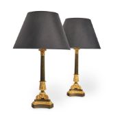 A PAIR OF EMPIRE STYLE GILT AND PATINATED BRONZE LAMPS, LATE 19TH/EARLY 20TH CENTURY
