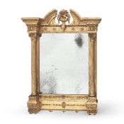 A GEORGE IV CARVED GILTWOOD WALL MIRROR, PROBABLY IRISH, CIRCA 1830