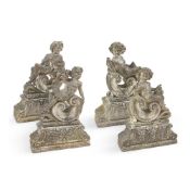 A SET OF FOUR LARGE COMPOSITION STONE GARDEN FIGURES OF PUTTI, FIRST HALF 20TH CENTURY