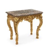A NORTH EUROPEAN LOUIS XV TASTE CARVED AND GILTWOOD MARBLE TOPPED CONSOLE TABLE, CIRCA 1740