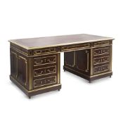 A FRENCH MAHOGANY AND BRASS MOUNTED PARTNERS DESK IN LOUIS XVI STYLE