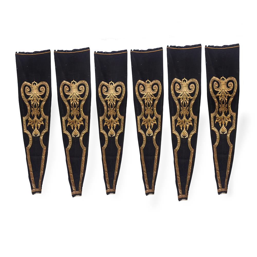 A SET OF SIX GOLD THREAD APPLIED BLACK VELVET PANELS FRENCH