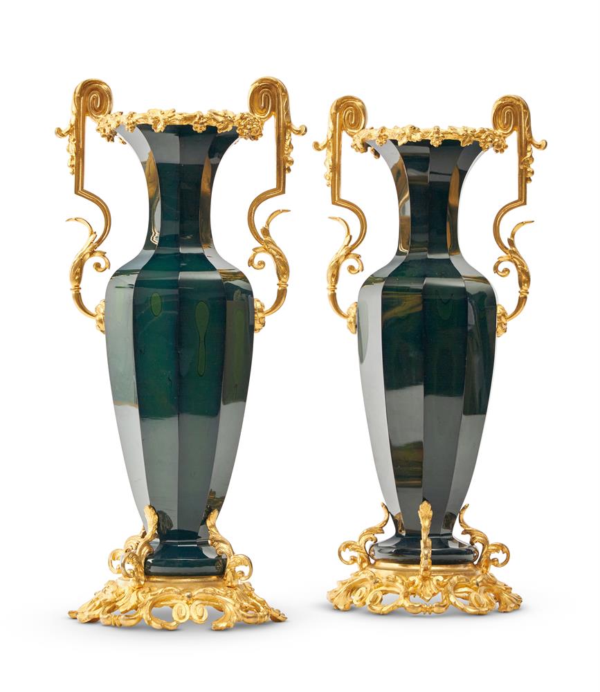 A PAIR OF BOHEMIAN GREEN LITHYALIN GLASS AND GILT METAL MOUNTED VASES, MID 19TH CENTURY