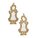 A PAIR OF ITALIAN ROCOCO CARVED GILTWOOD MIRRORS, CIRCA 1890