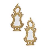 A PAIR OF ITALIAN ROCOCO CARVED GILTWOOD MIRRORS, CIRCA 1890