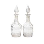 A PAIR OF CUT GLASS DECANTERS AND STOPPERS, SECOND QUARTER 19TH CENTURY