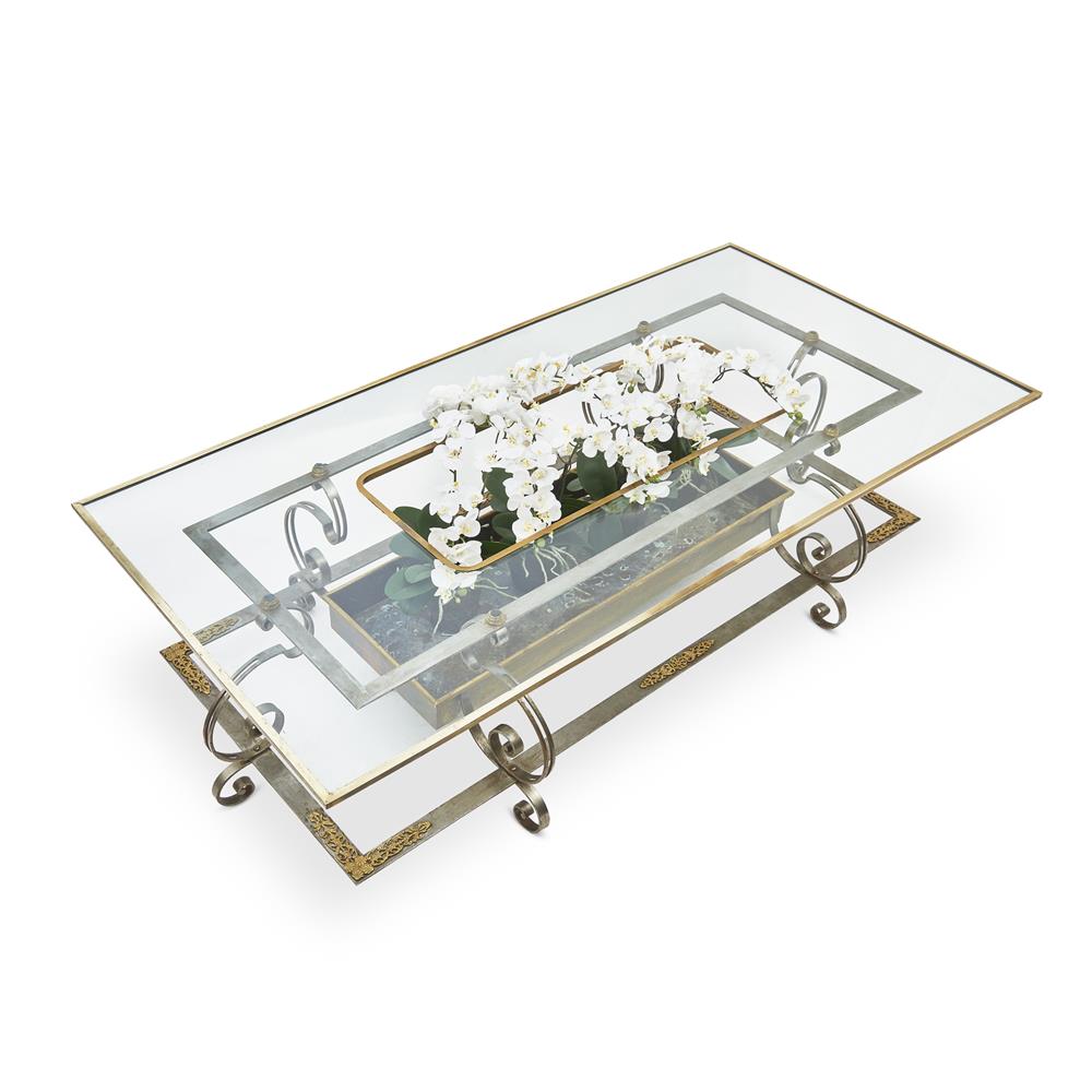 A BRASS, STEEL AND GLASS LOW CENTRE TABLE CIRCA 1965, POSSIBLY SPANISH