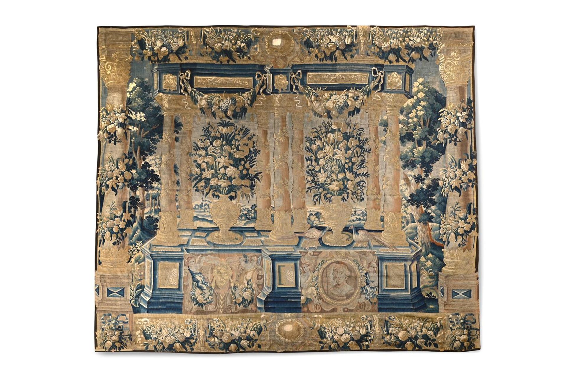 A FLORAL PORTICO TAPESTRY,FLEMISH, LATE 17TH/EARLY 18TH CENTURY
