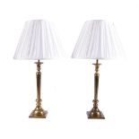 A PAIR OF PATINATED BRASS TABLE LAMPS