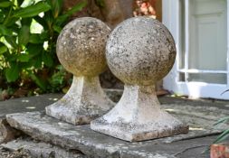 A PAIR OF COMPOSITION STONE PIER FINIALS IN EDWARDIAN TASTE