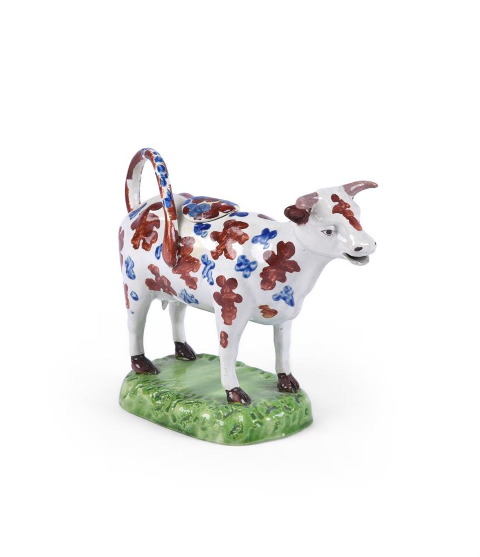 A BRITISH PEARLWARE COW CREAMER