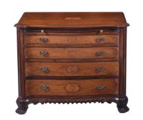 A HARDWOOD SERPENTINE FRONTED COMMODE, IN GEORGE III STYLE